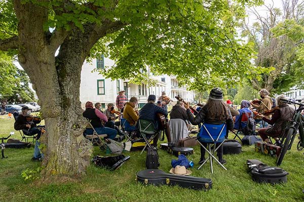 Fiddle tunes on grass at Fort Worden
