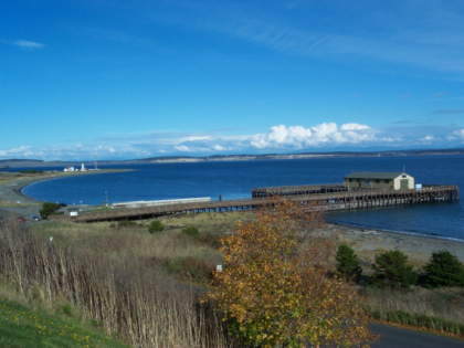 Fort Worden State Park's pier, beach, and lighthouse in the distance