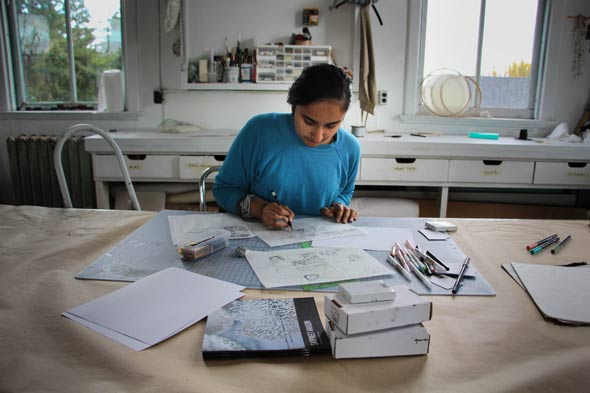 Multidisciplinary conceptual artist Satpreet Kahlon works on some sketches in her studio in Fort Worden’s Building 205.
